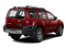 Red Brick 2011 Nissan Xterra Pictures Xterra Utility 4D Pro-4X 4WD photos rear view Red Brick 2011 Nissan Xterra Pictures Xterra Utility 4D Pro-4X 4WD photos rear view