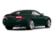 British Racing Green 2015 Jaguar XK Pictures XK Coupe 2D XKR V8 Supercharged photos rear view British Racing Green 2015 Jaguar XK Pictures XK Coupe 2D XKR V8 Supercharged photos rear view