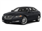 2014 Jaguar XF Pictures XF Sedan 4D Portfolio V6 Supercharged photos side front view 2014 Jaguar XF Pictures XF Sedan 4D Portfolio V6 Supercharged photos side front view