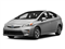 2014 Toyota Prius Pictures Prius Liftback 5D Three I4 Hybrid photos side front view 2014 Toyota Prius Pictures Prius Liftback 5D Three I4 Hybrid photos side front view