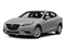 2015 Mazda Mazda3 Pictures Mazda3 Sedan 4D i Touring I4 photos side front view 2015 Mazda Mazda3 Pictures Mazda3 Sedan 4D i Touring I4 photos side front view